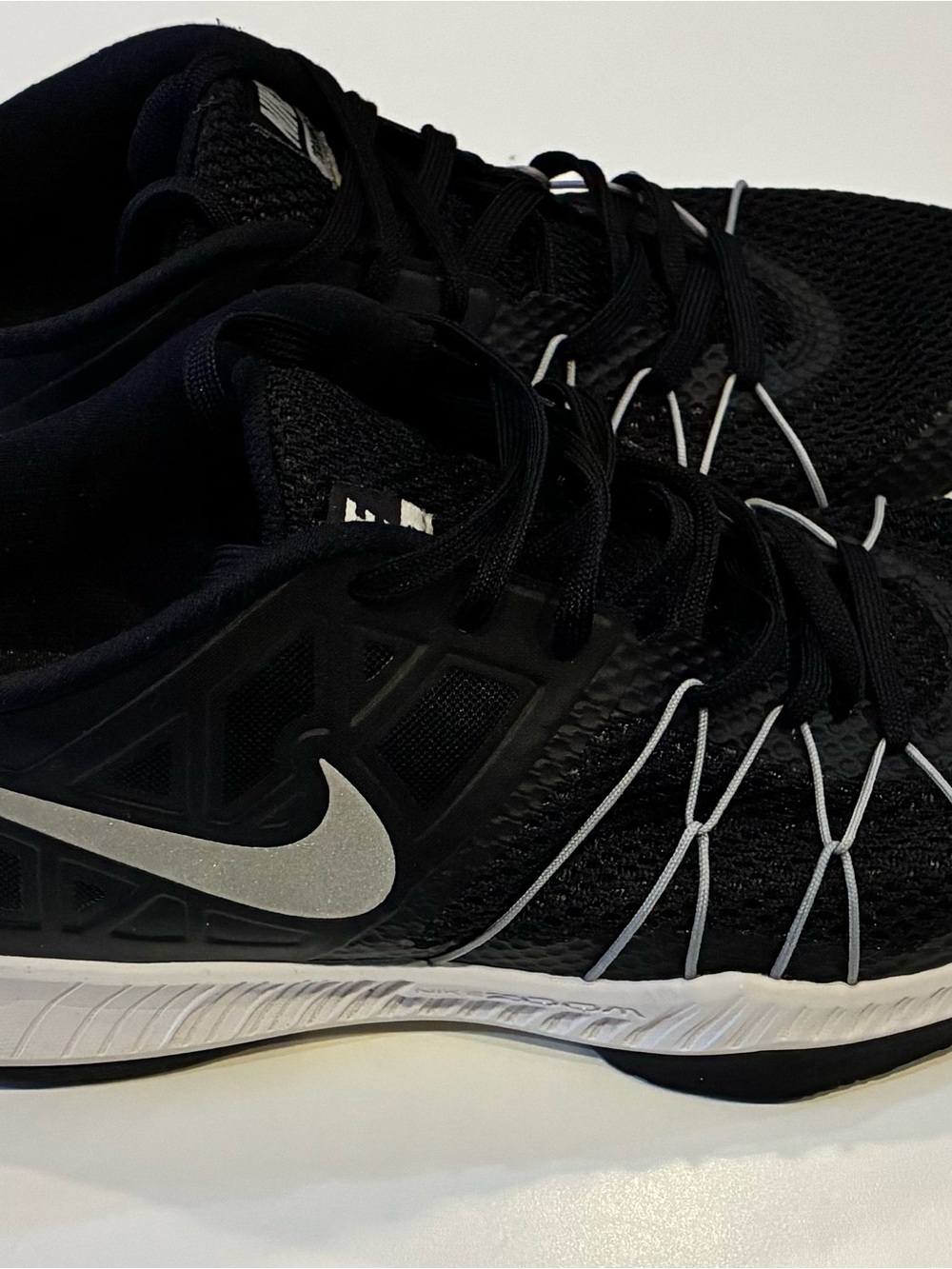 Nike Men’s Black Sneakers with Silver Swoosh and White Accents